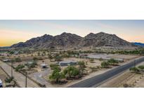 Expansive property with mountain views, horse facilities and mature landscaping at 11912 N Thunderbird Rd, Maricopa, AZ 85139
