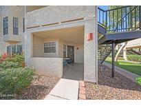 Cozy covered patio with a small table and chairs offers a relaxing outdoor space at 2333 E Southern Ave # 1049, Tempe, AZ 85282
