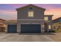Charming home featuring a two-car garage and inviting curb appeal at 4285 E Rousay Dr, San Tan Valley, AZ 85140