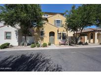 Charming two-story home with an inviting entryway and mature trees shading the front at 451 S Hawes Rd # 53, Mesa, AZ 85208