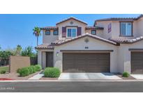 Attractive two-story home featuring a well-manicured lawn and a two-car garage at 1255 N Arizona Ave # 1251, Chandler, AZ 85225