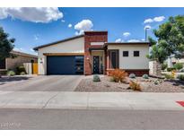 Charming single-story home featuring a modern design and low-maintenance desert landscaping at 1202 E Nolan Pl, Chandler, AZ 85249
