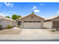 Charming single-story home with a two-car garage and low-maintenance desert landscaping at 4615 W Del Rio St, Chandler, AZ 85226