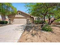 Charming single story home with a two car garage and xeriscape landscaping at 10591 E Morning Star Dr, Scottsdale, AZ 85255