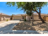 Charming single-story home featuring a well-maintained front yard and attached two-car garage at 1356 S Mosley Ct, Chandler, AZ 85286