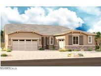 Inviting single-story home featuring a two-car garage, stone accents, neutral color palette, and well-manicured landscaping at 20256 W Monterey Way, Buckeye, AZ 85396
