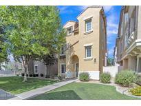 Charming two-story home features a well-maintained lawn and inviting curb appeal on a sunny day at 4159 E Jasper Dr, Gilbert, AZ 85296
