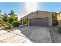 Charming single-story home features a two-car garage, driveway, and low maintenance landscaping at 865 E Del Rio St, Chandler, AZ 85225