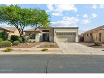Charming single-story home featuring desert landscaping and a two-car garage at 8758 W Myrtle Ave, Glendale, AZ 85305