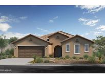 Inviting single-story home with a tile roof, an arched entryway, a two-car garage, and desert landscaping at 17181 W Oberlin Way, Surprise, AZ 85387