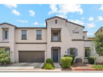 Beautiful two-story townhome with attached garage and balcony, located in a desirable neighborhood at 3900 E Baseline Rd # 166, Phoenix, AZ 85042
