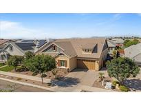 Inviting single-story home featuring a manicured front yard and attached two car garage at 4426 E Leroy St, Gilbert, AZ 85295