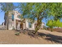 Charming single-Gathering home showcasing desert landscaping and a welcoming front entrance at 8429 W Vernon Ave, Phoenix, AZ 85037