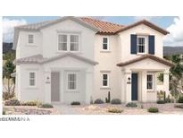 Inviting two-story home featuring a warm-toned facade and stylish architectural details at 2807 N Claire Dr, Buckeye, AZ 85396