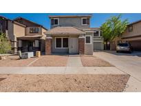 Charming two-story home with a well-maintained yard and a classic architectural style at 4010 W Fremont Rd, Phoenix, AZ 85041