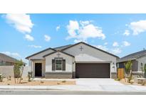 Charming single-story home featuring neutral-toned stucco and a two-car garage, perfect for suburban living at 48401 N Duran Way, Gold Canyon, AZ 85118