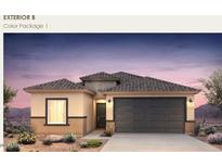 Charming single-story home with a two-car garage and desert landscaping at 5029 S 252Nd Ave, Buckeye, AZ 85326