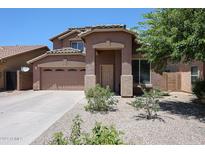Charming two-story home featuring a well-maintained front yard and a two-car garage at 2934 W Peggy Dr, San Tan Valley, AZ 85144