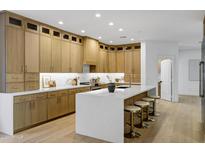 Spacious kitchen features a large island with seating and abundant cabinet space at 2774 E Valencia St, Gilbert, AZ 85296