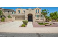Stunning two-story home featuring a neutral stucco exterior and well-manicured landscaping at 2920 E Virginia E St, Mesa, AZ 85213