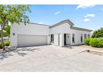 Charming single-story home featuring a two-car garage and manicured landscaping at 295 N Rural Rd # 133, Chandler, AZ 85226