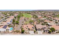 Expansive aerial view of a golf community featuring desert landscaping and homes with solar panels at 20655 N 273Rd Ave, Buckeye, AZ 85396