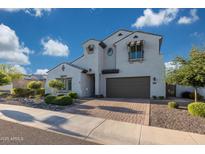 Charming two-story home featuring a spacious two car garage and well manicured landscaping at 21194 W Hillcrest Blvd, Buckeye, AZ 85396