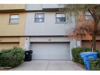 Exterior shot of a home with a two-car garage and concrete driveway at 120 W Milada Dr, Phoenix, AZ 85041