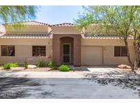 Inviting single-story home featuring a well-manicured front yard and an attached one car garage at 16450 E Avenue Of The Fountain Ave # 11, Fountain Hills, AZ 85268