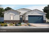 Charming single-story home with blue garage door, stone accents, and low-maintenance desert landscaping at 24405 W Grenadine Rd, Buckeye, AZ 85326