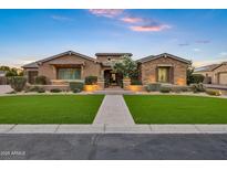 Charming single-story home with well-manicured lawn, tasteful landscaping, and inviting curb appeal at 3010 E Fruitvale Ave, Gilbert, AZ 85297
