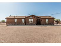 Inviting single-story home with desert landscaping and charming architectural details at 37334 N 17Th Ave, Phoenix, AZ 85086