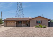 Lovely single-story home with well-maintained landscaping and neutral color scheme at 5204 E Colby St, Mesa, AZ 85205