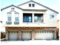 Charming two-story home featuring a three-car garage and a private second story balcony at 1350 S Greenfield Rd # 2231, Mesa, AZ 85206