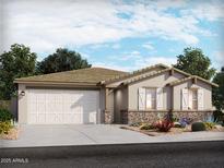 Charming single-story home featuring desert landscaping, a two-car garage and a neutral color palette at 17732 W Amber Dr, Goodyear, AZ 85338