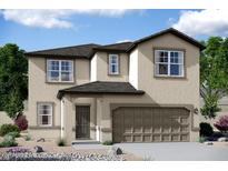 Two-story home with a two-car garage and neutral color palette at 15512 W Corte Del Sol Este --, Waddell, AZ 85355