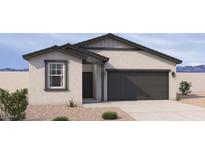 Charming single-story home with a modern exterior, neutral color palette, and well-manicured landscaping at 18243 W La Senda Dr, Surprise, AZ 85387