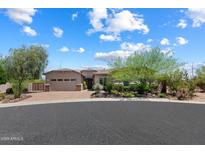 Charming single-story home with desert landscaping and a three-car garage at 31409 N 58Th Pl, Cave Creek, AZ 85331