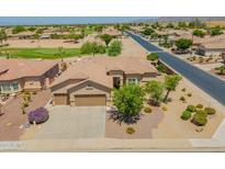 Beautiful single-Gathering home featuring a well-maintained desert landscape and a three-car garage at 6931 S Four Peaks Way, Chandler, AZ 85249