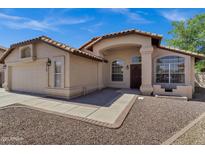 Charming single-story home featuring a tile roof, stucco exterior, and well-maintained landscaping at 1245 W Cindy St, Chandler, AZ 85224