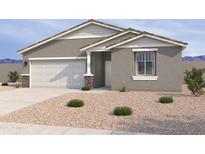Charming single-story home with a stucco exterior, a two-car garage, and low-maintenance desert landscaping at 18253 W Camino De Oro --, Surprise, AZ 85387