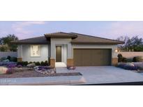 Beautiful single-story home featuring a modern design, desert landscaping, and a two-car garage at 2973 E Mecklenburg Way, San Tan Valley, AZ 85143