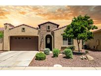 Charming single-story home with a well-maintained front yard and two car garage at 16426 W Piccadilly Rd, Goodyear, AZ 85395