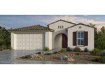 Charming single-story home showcasing stucco siding, a two-car garage, and low-maintenance landscaping at 25252 N 169Th Dr, Surprise, AZ 85387