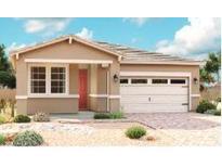 Charming single-story home featuring a two-car garage, neutral colors, and a well-manicured front yard at 39994 W Anne Ln, Maricopa, AZ 85138