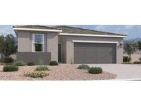 Charming single-story home featuring a two-car garage and neutral color palette at 47437 W Kenner Dr, Maricopa, AZ 85139