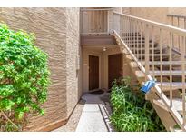 Building entry with stairs to the upper units and secure entry doors at 2228 N 52Nd St # 140, Phoenix, AZ 85008