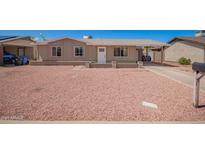 Cozy single-story home featuring a well-maintained facade and low-maintenance desert landscaping at 8818 W Pinchot Ave, Phoenix, AZ 85037