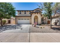Charming two-story home with a spacious two car garage and desert landscaping at 2531 W Saint Catherine Ave, Phoenix, AZ 85041