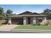 Charming single-story home with a well-manicured lawn and a two-car garage, complete with desert landscaping at 25437 N 176Th Ave, Surprise, AZ 85387